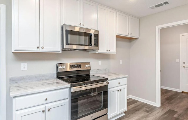 kitchen with white cabinets and stainless steel appliances