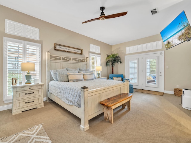 carpeted bedroom with access to exterior and ceiling fan