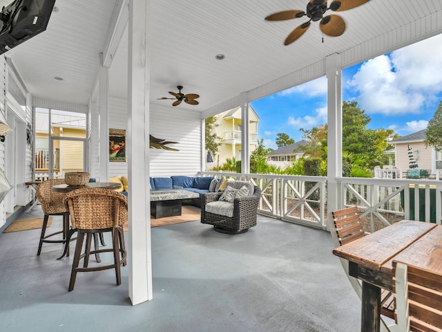 sunroom / solarium with ceiling fan