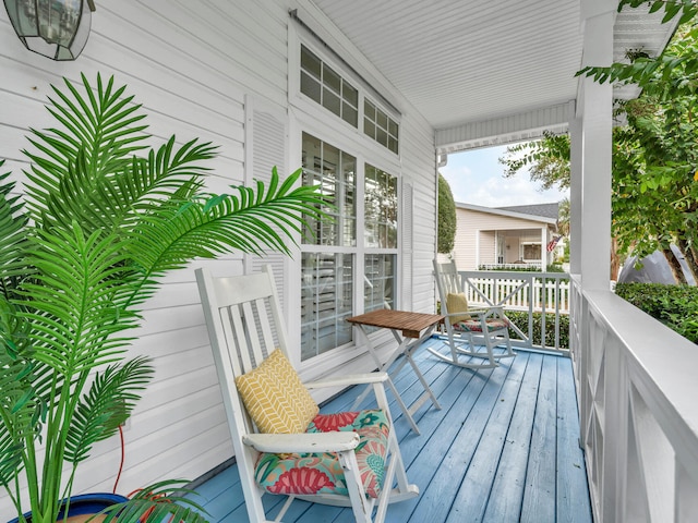 wooden terrace with covered porch