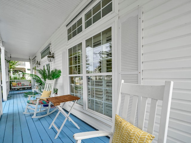 wooden deck with a porch