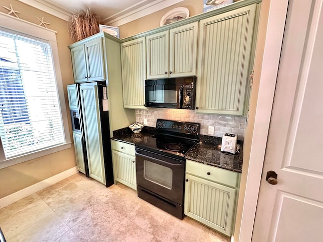 kitchen featuring green cabinetry, black appliances, tasteful backsplash, ornamental molding, and dark stone countertops