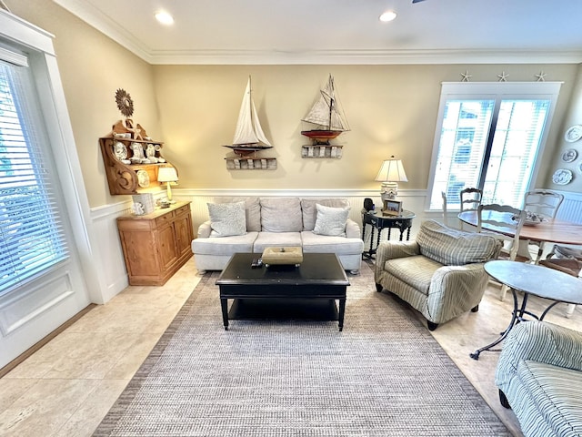 2450 Bungalo Ln, Miramar Beach, FL 32550 - living area featuring ornamental molding, recessed lighting, light tile patterned flooring, wainscoting, and a decorative wall