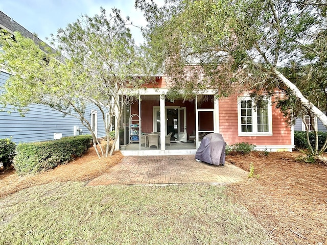 2450 Bungalo Ln, Miramar Beach, FL 32550 - back of house with a patio area