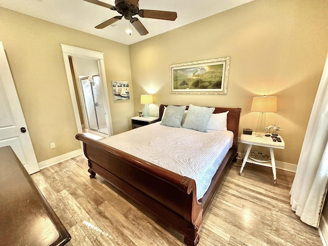 2450 Bungalo Ln, Miramar Beach, FL 32550 - bedroom featuring light wood-style flooring, ceiling fan, and baseboards