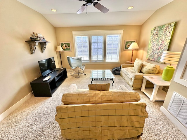 carpeted living room featuring lofted ceiling and ceiling fan