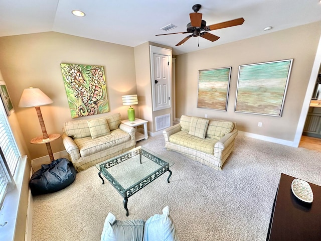 living room with carpet, lofted ceiling, and ceiling fan