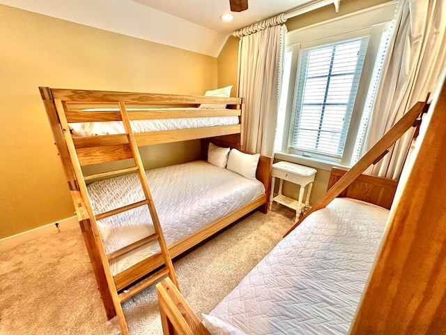 bedroom featuring ceiling fan and carpet floors