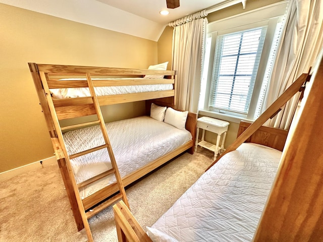2450 Bungalo Ln, Miramar Beach, FL 32550 - bedroom with carpet flooring, vaulted ceiling, recessed lighting, and baseboards