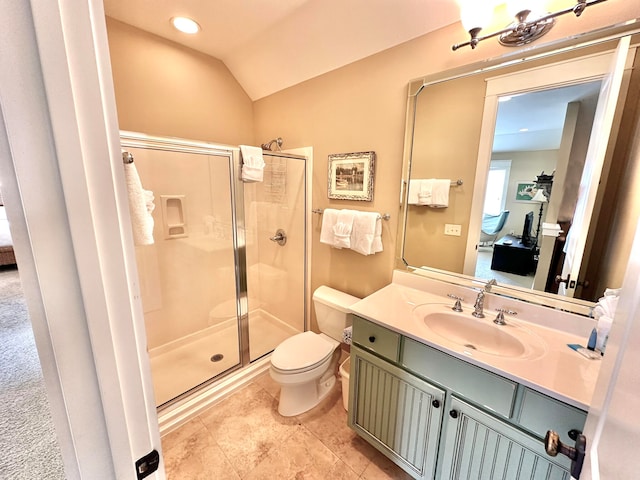 bathroom featuring walk in shower, vanity, toilet, and vaulted ceiling