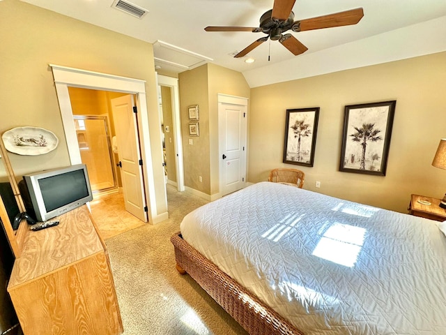 carpeted bedroom with lofted ceiling and ceiling fan