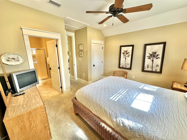 2450 Bungalo Ln, Miramar Beach, FL 32550 - bedroom with light colored carpet, connected bathroom, vaulted ceiling, ceiling fan, and baseboards