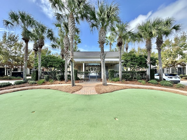 2450 Bungalo Ln, Miramar Beach, FL 32550 - view of property's community with a putting area and fence