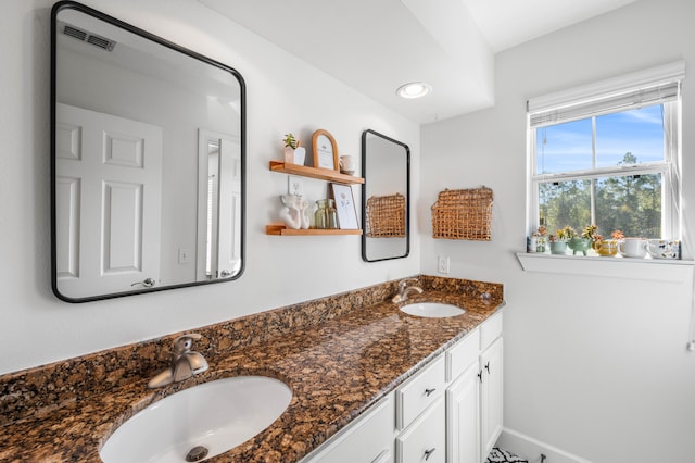 bathroom featuring vanity