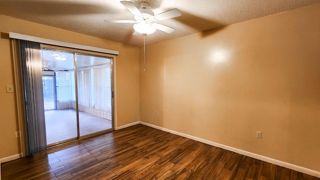 unfurnished room featuring dark hardwood / wood-style floors, a textured ceiling, and ceiling fan