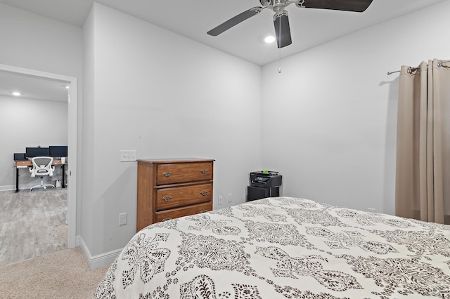 bedroom with ceiling fan and wood-type flooring