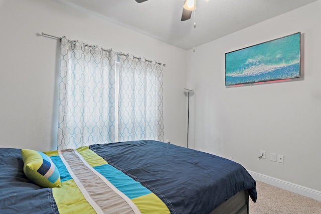 bedroom featuring carpet and ceiling fan