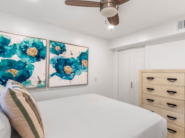 bedroom with a closet and ceiling fan