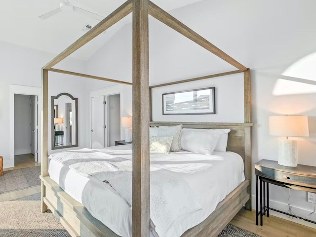 bedroom with ceiling fan and light hardwood / wood-style floors