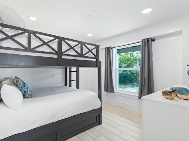 bedroom with light hardwood / wood-style flooring