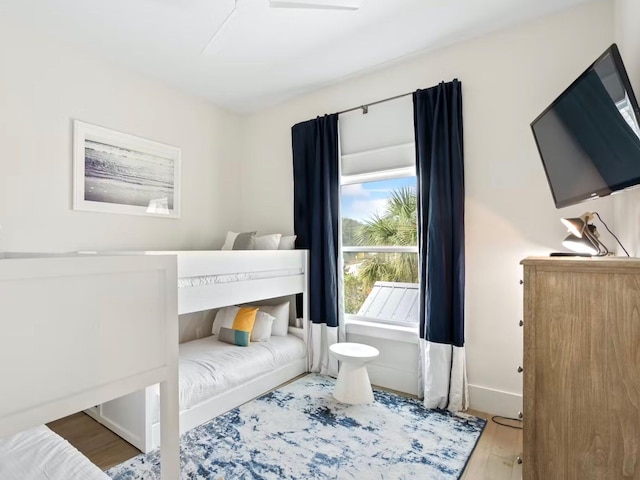 bedroom with hardwood / wood-style flooring