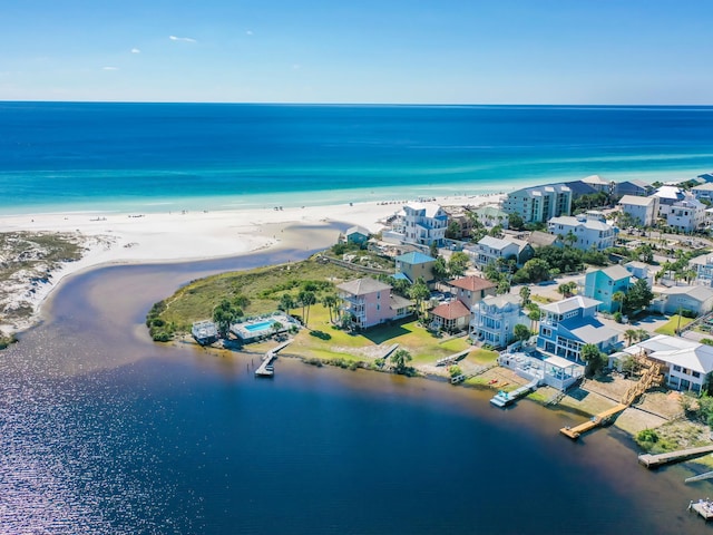 drone / aerial view with a view of the beach and a water view