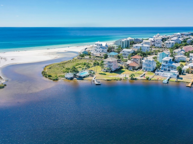 aerial view featuring a water view and a beach view