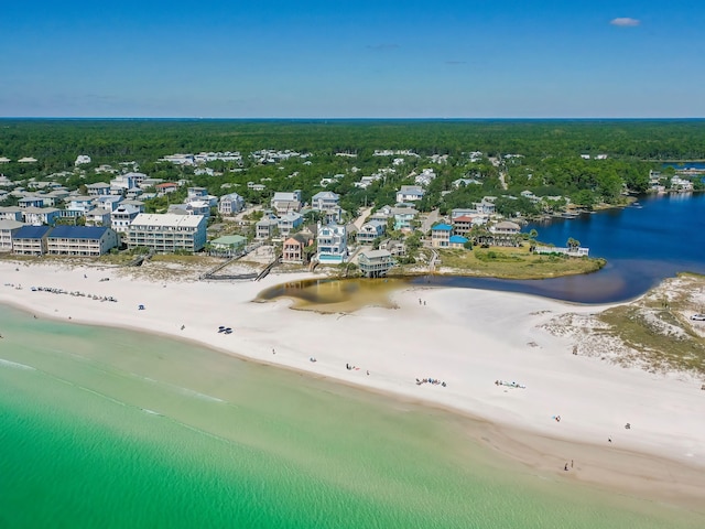 drone / aerial view with a water view and a view of the beach