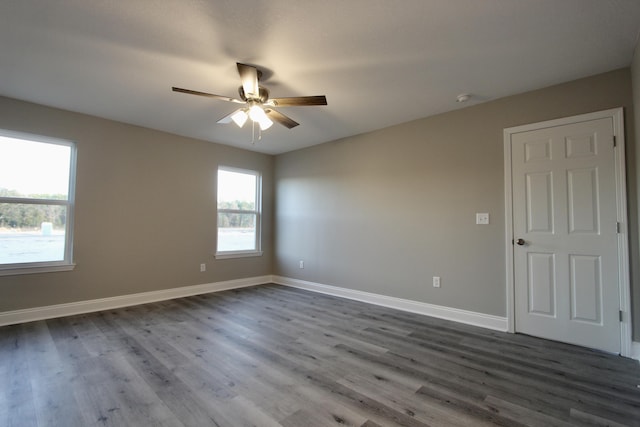 empty room with wood-type flooring and ceiling fan