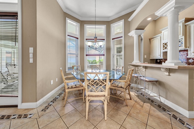 4705 Seastar Vis, Destin, FL 32541 - dining room with an inviting chandelier, ornamental molding, baseboards, ornate columns, and light tile patterned floors