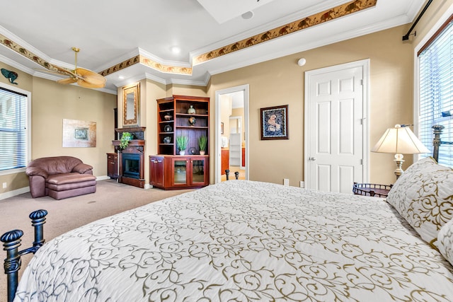4705 Seastar Vis, Destin, FL 32541 - carpeted bedroom with crown molding, baseboards, and a fireplace