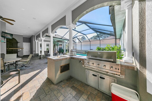 4705 Seastar Vis, Destin, FL 32541 - view of patio / terrace featuring an outdoor kitchen, a ceiling fan, a lanai, and grilling area