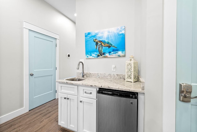 kitchen featuring white cabinets, light wood-type flooring, dishwasher, sink, and light stone counters