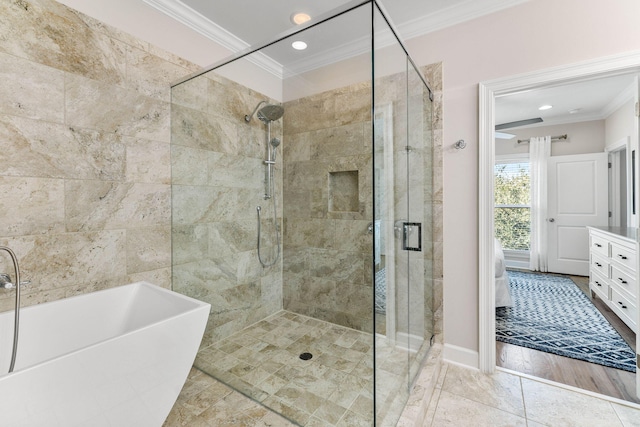 bathroom featuring crown molding, shower with separate bathtub, and hardwood / wood-style flooring