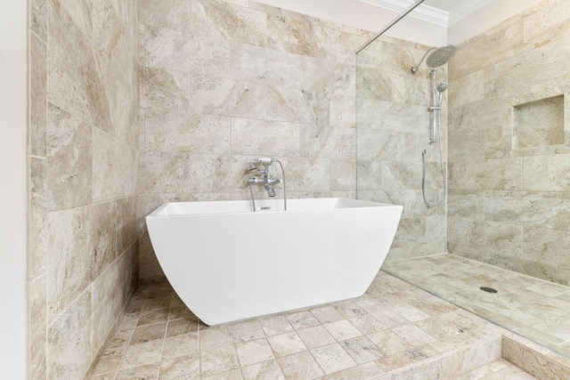 bathroom featuring crown molding and shower with separate bathtub