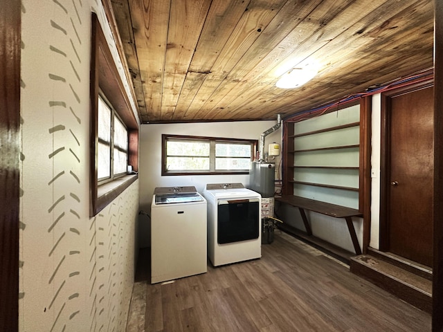 laundry area with washing machine and clothes dryer, hardwood / wood-style floors, wood ceiling, and gas water heater