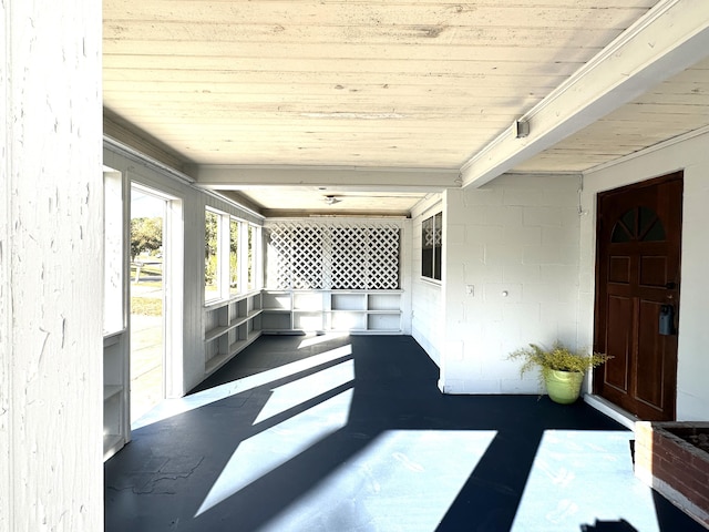 sunroom / solarium with beam ceiling and wood ceiling