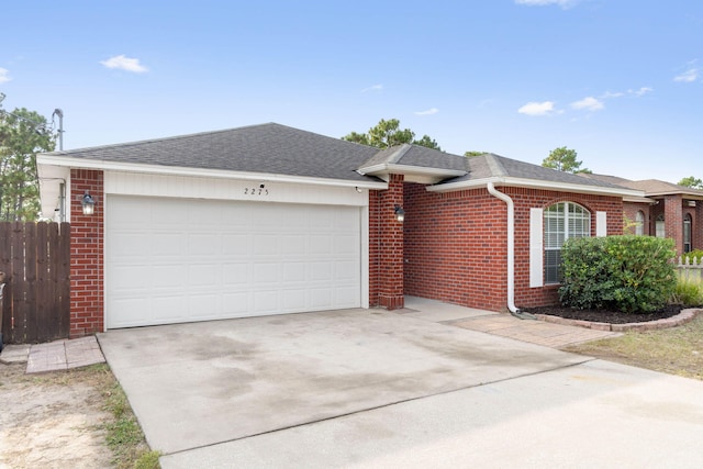 single story home featuring a garage