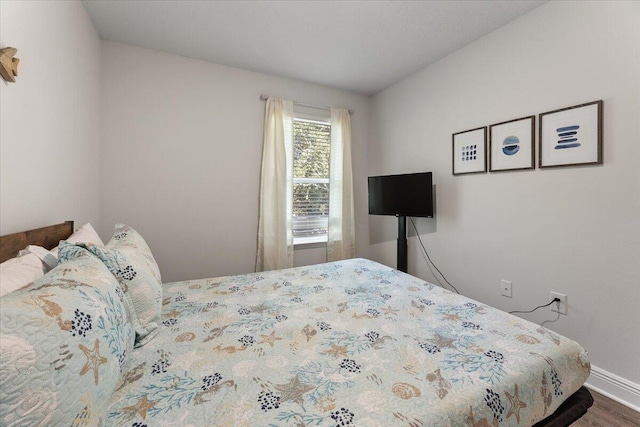 bedroom featuring hardwood / wood-style floors