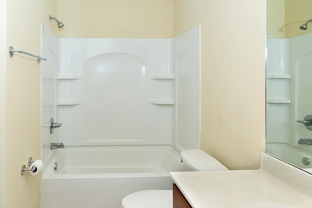 full bathroom with vanity, toilet, and washtub / shower combination