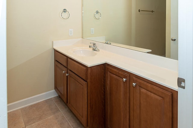 bathroom with vanity and tile patterned flooring