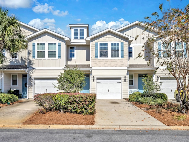 multi unit property featuring a garage