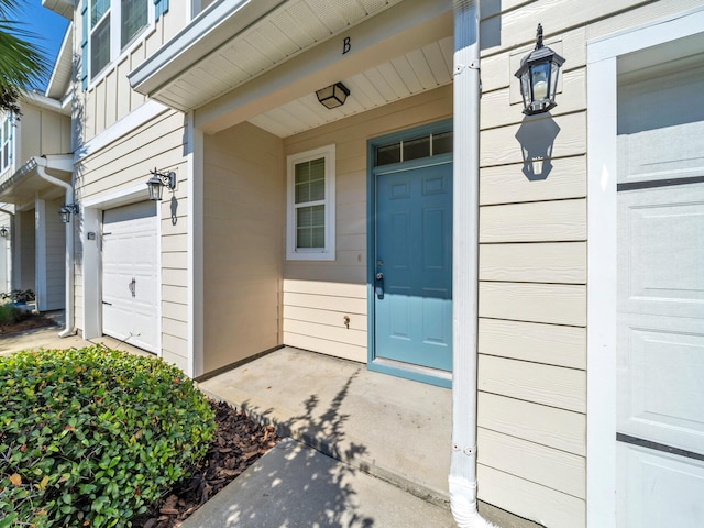 property entrance featuring a garage