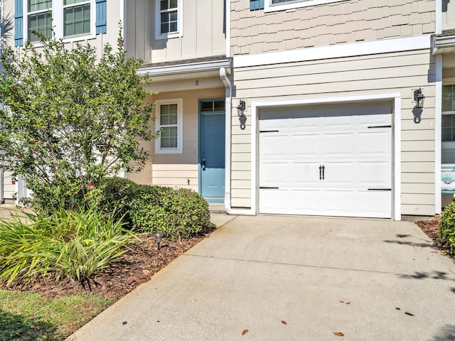 property entrance featuring a garage