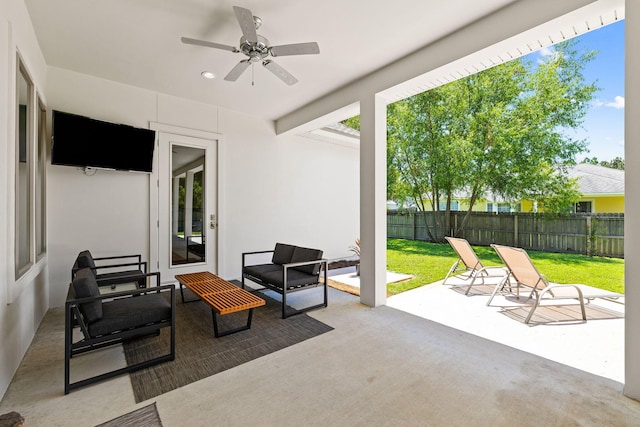 view of patio featuring french doors, ceiling fan, and outdoor lounge area