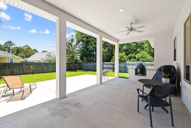 view of patio / terrace featuring ceiling fan