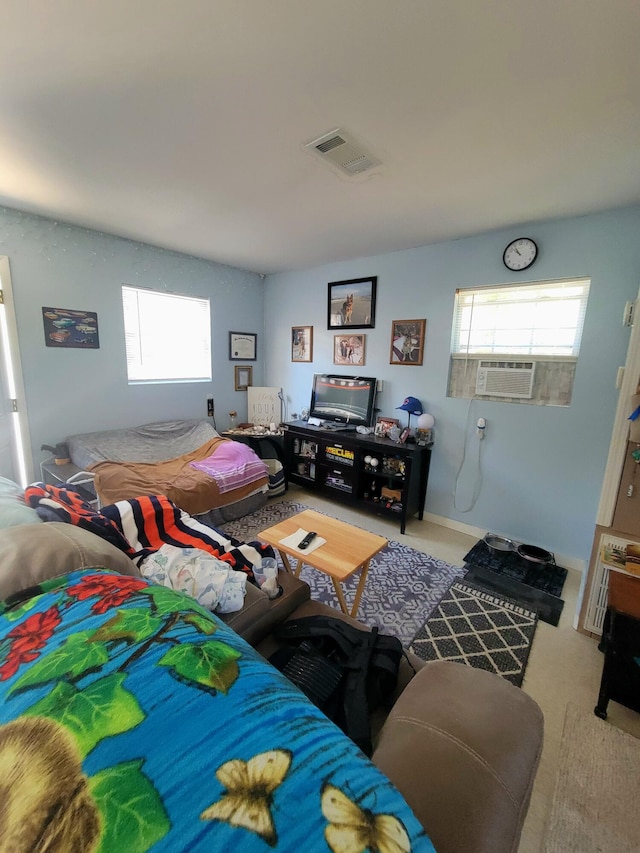 carpeted living room featuring cooling unit