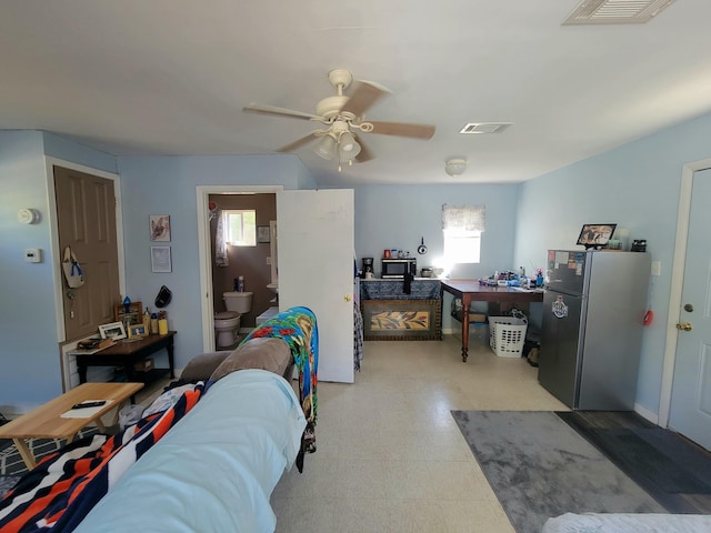 living room with ceiling fan