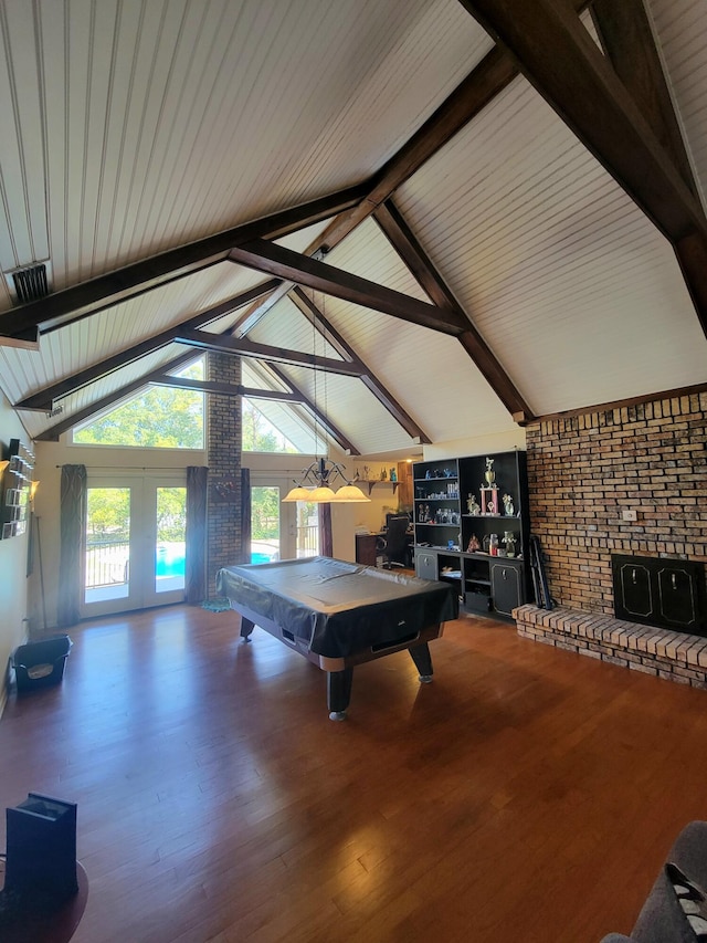 rec room with billiards, vaulted ceiling with beams, and hardwood / wood-style flooring