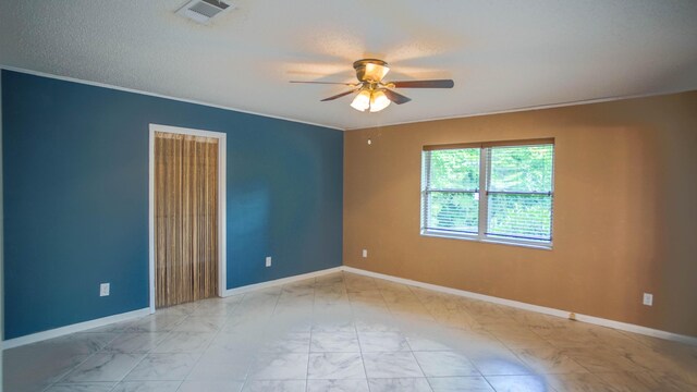 1097 Bob Mccaskill Dr, Defuniak Springs, FL 32433 - unfurnished room featuring ceiling fan, light marble finish floors, baseboards, and ornamental molding